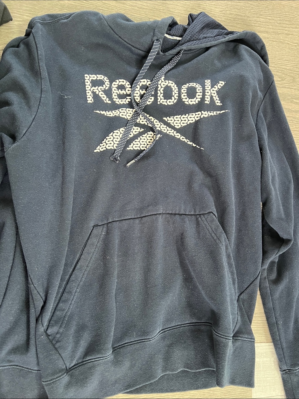 Vintage Reebok Black Hoodie with White Logo Pattern